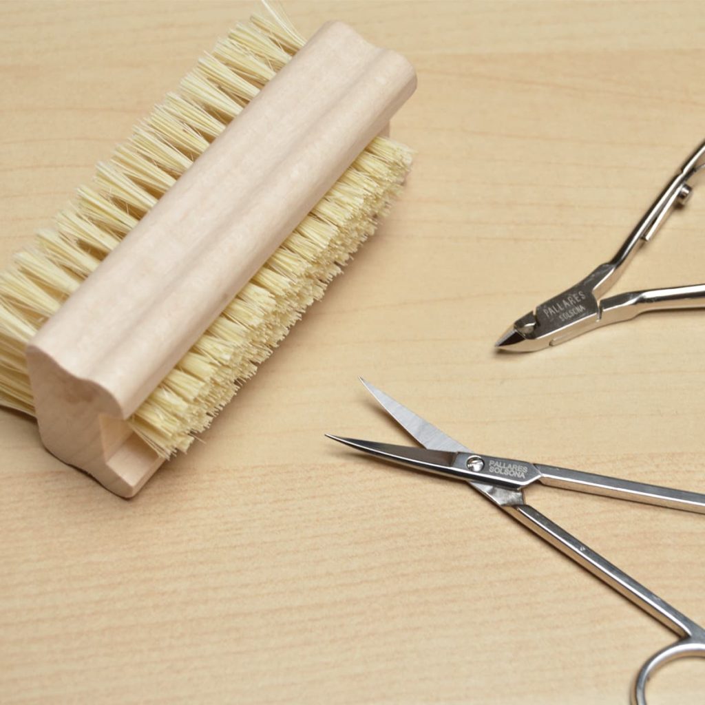 cepillo para uñas de dos filas