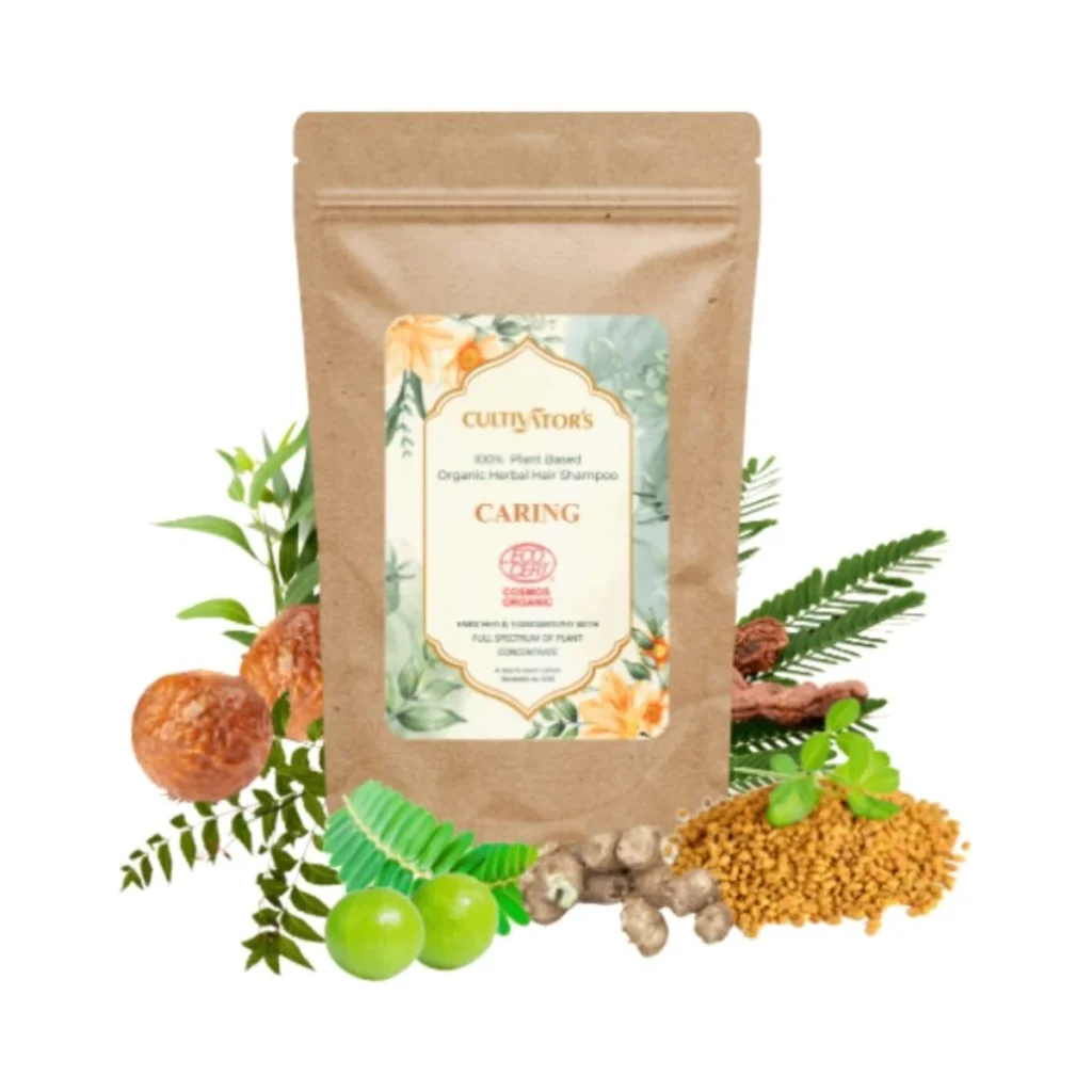 bolsa de champú orgánico en polvo caring de cultivators rodeada de las plantas y semillas de sus ingredientes