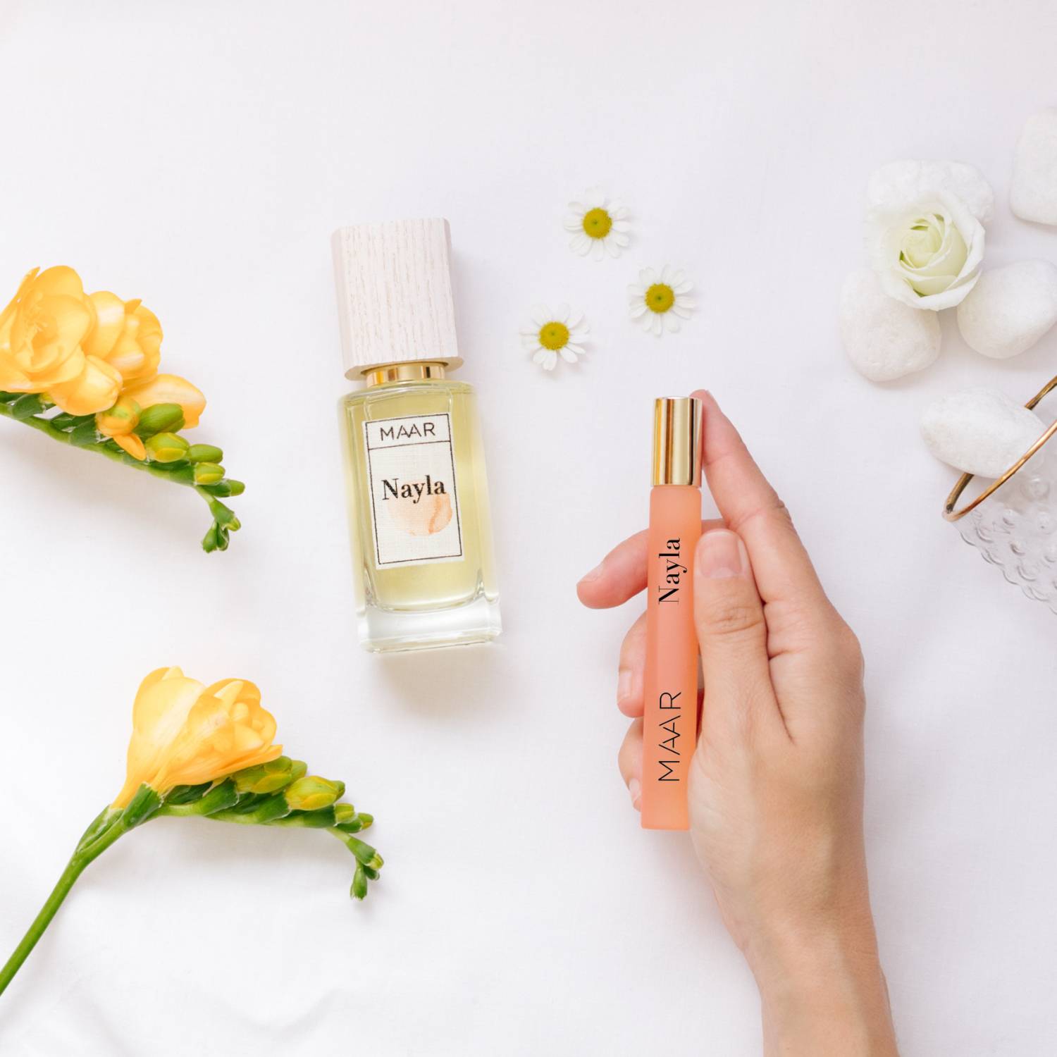 Diferentes formatos, perfume Nayla de notas florales