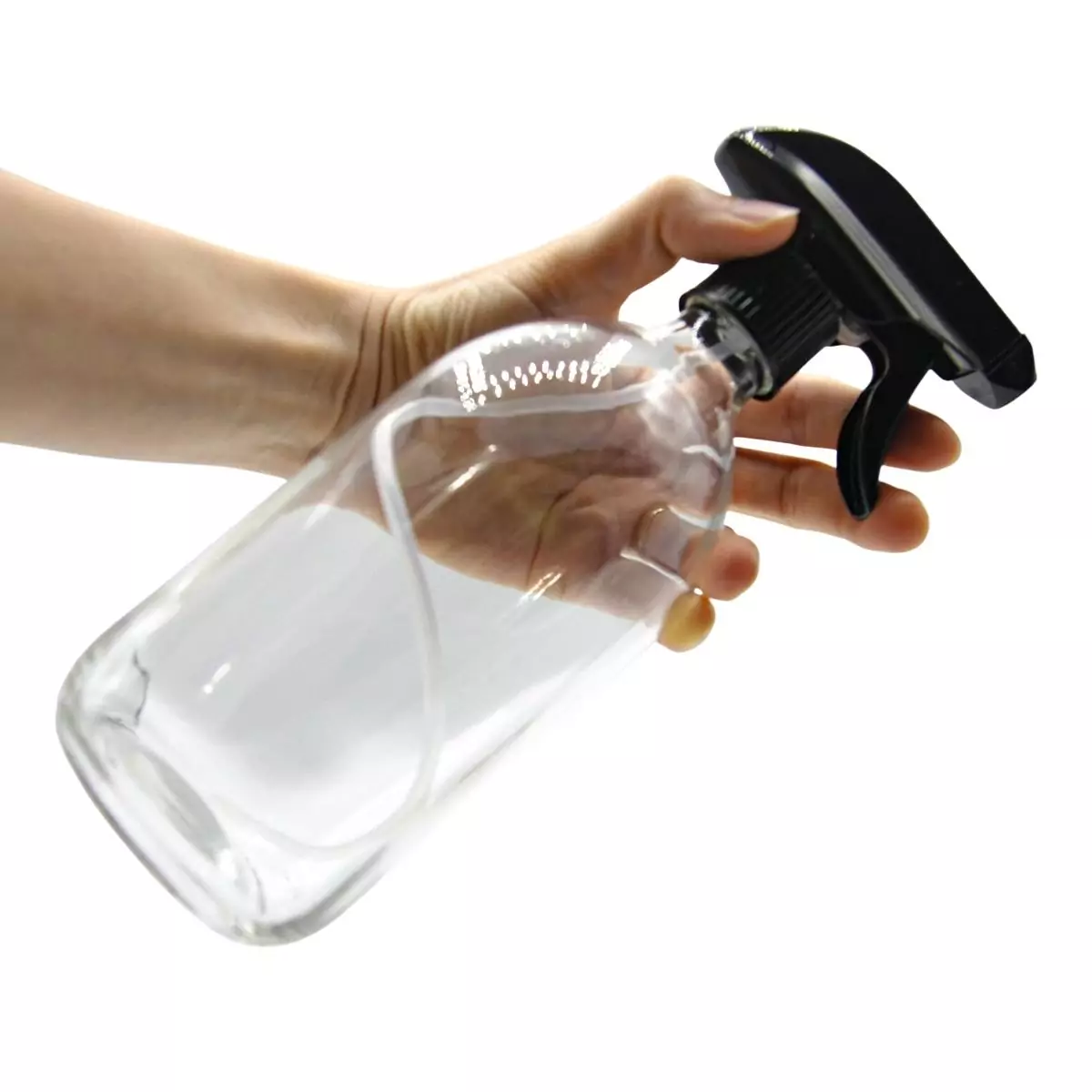 Botella de vidrio transparente con pulverizador mano