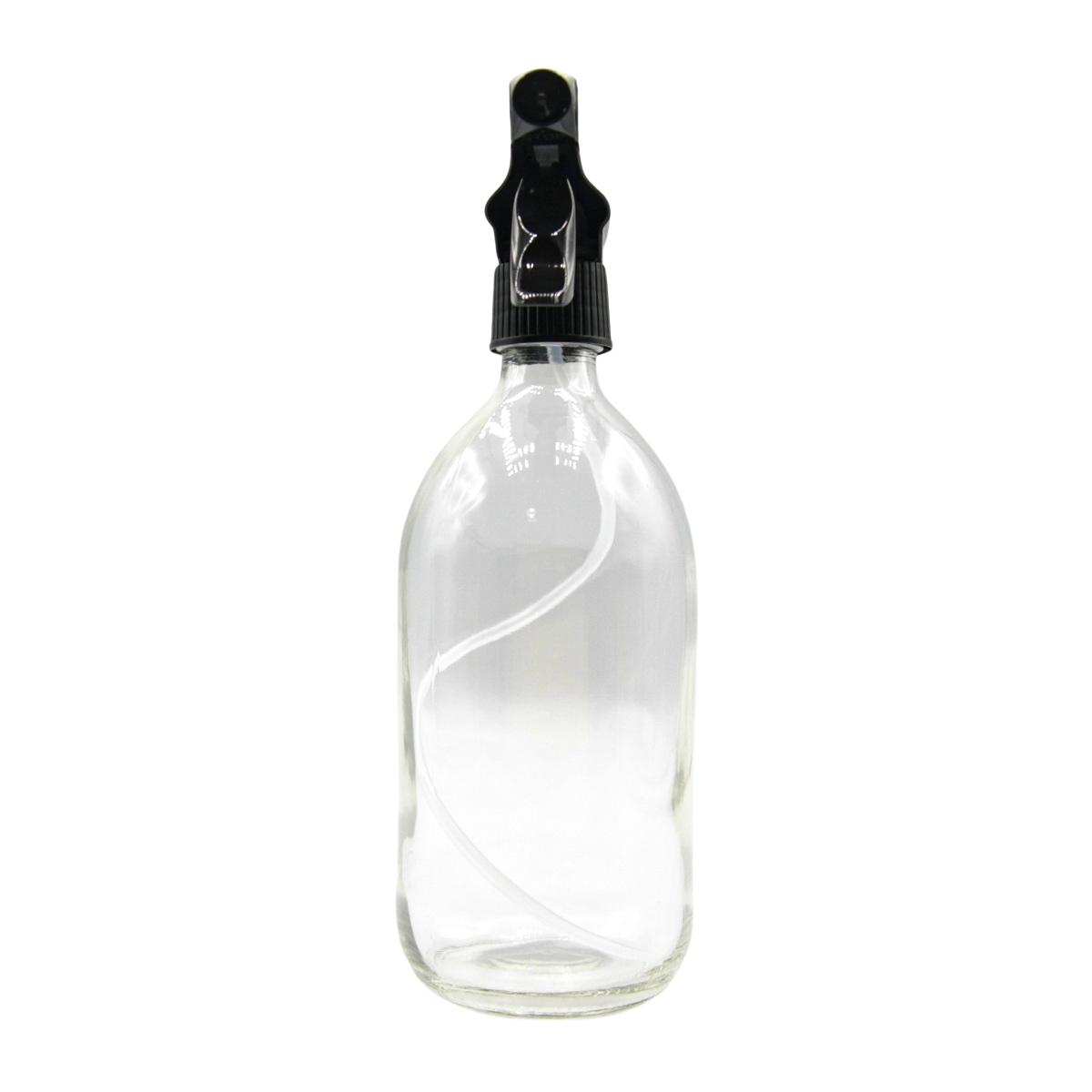 Botella de vidrio transparente con pulverizador frente