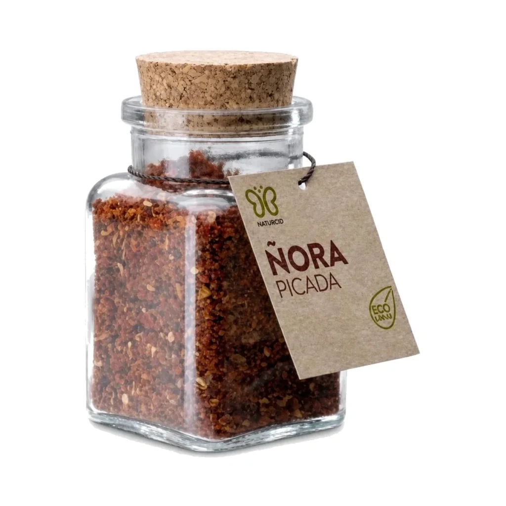 tarro de cristal con tapón de corcho de ñora picada ecológica naturcid