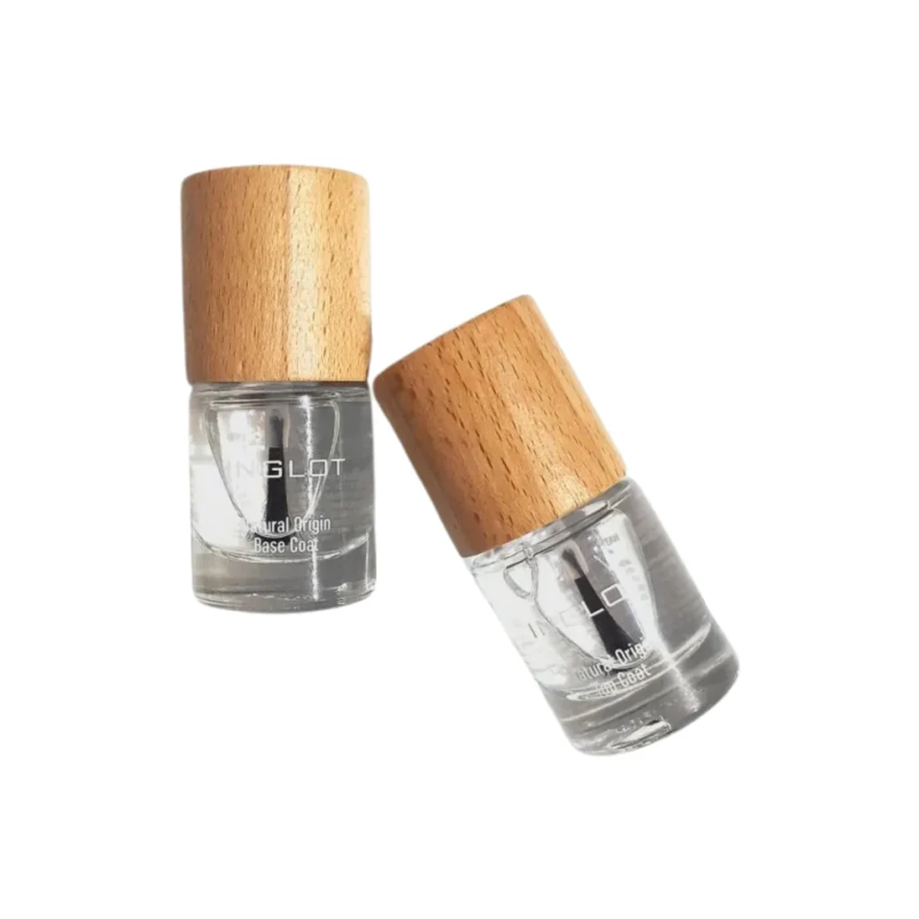 dos frascos de base coat natural de inglot, uno de pie y otro inclinado