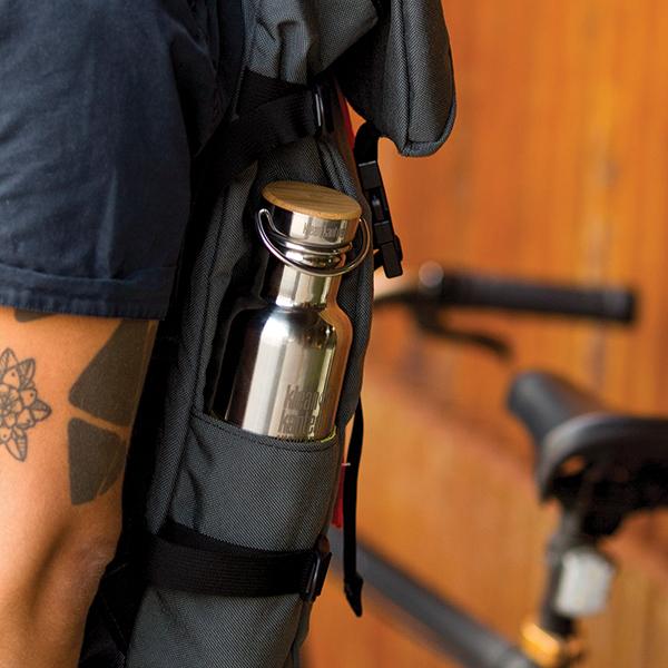 K27SSLRF-MS-bamboo-cap-backpack-and-bike_lifestyle